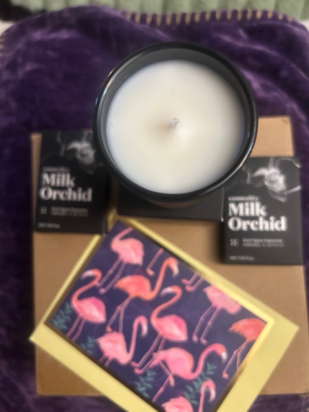 COMMODITY FRAGRANCE GIFT , candle , and two 2 ml perfumes / candle is 2.5 ounce
